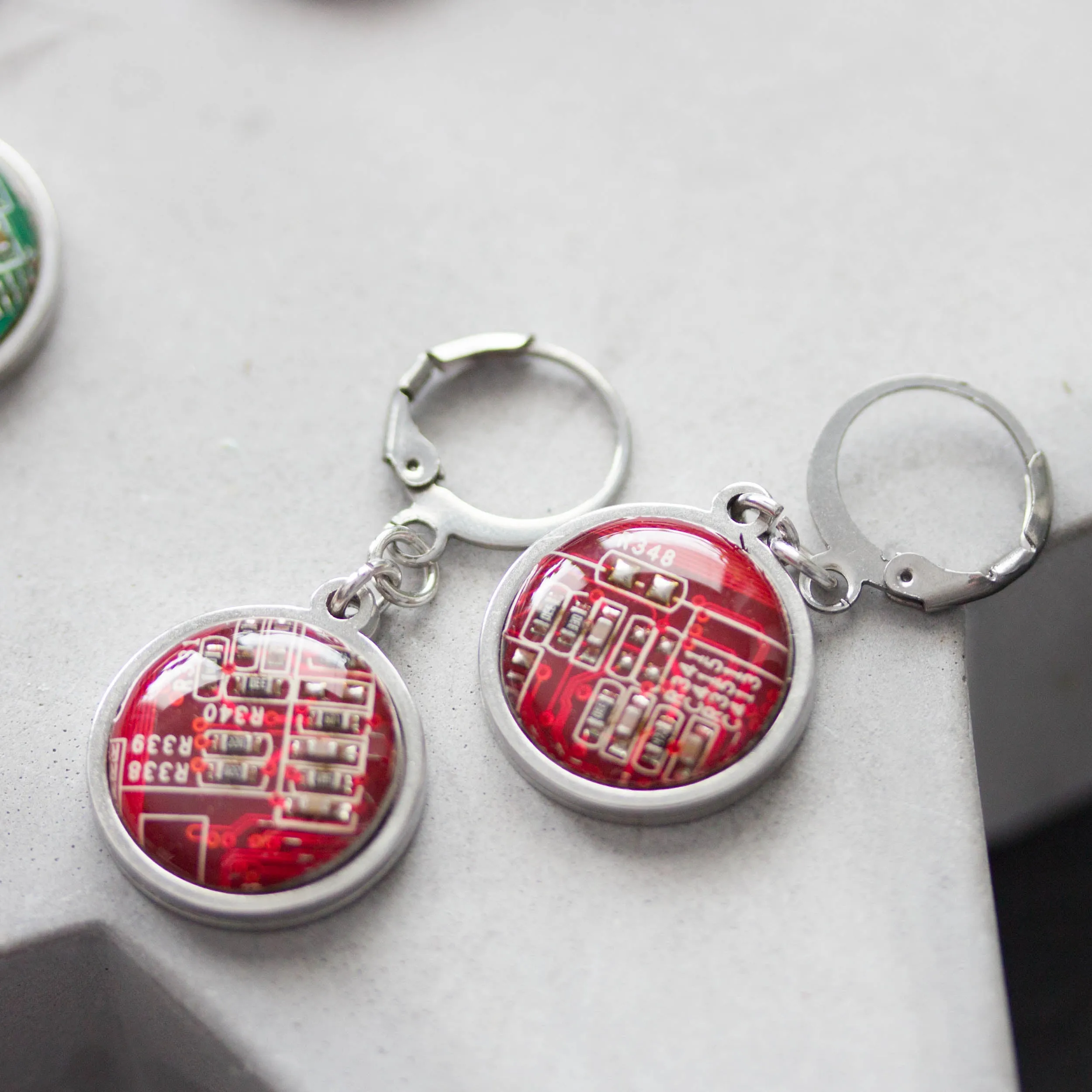 Dangle earrings with 15mm round circuit board pendants, steel wires