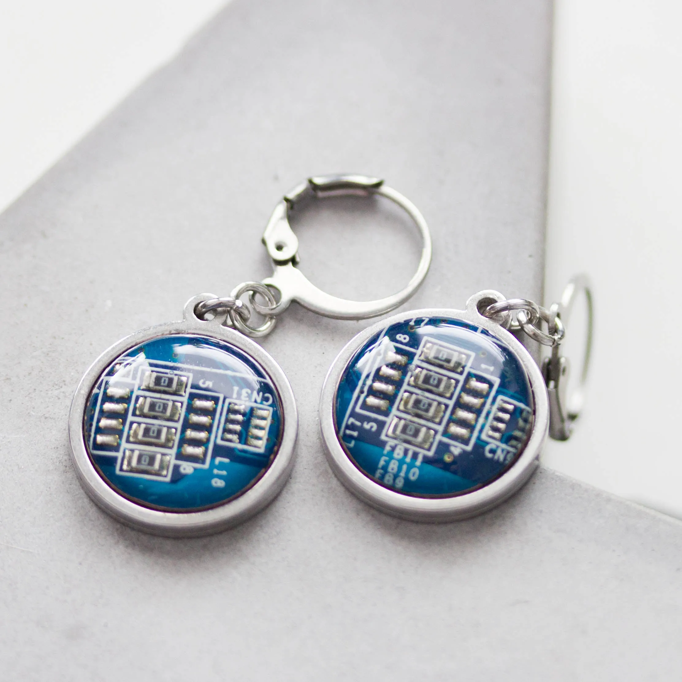 Dangle earrings with 15mm round circuit board pendants, steel wires
